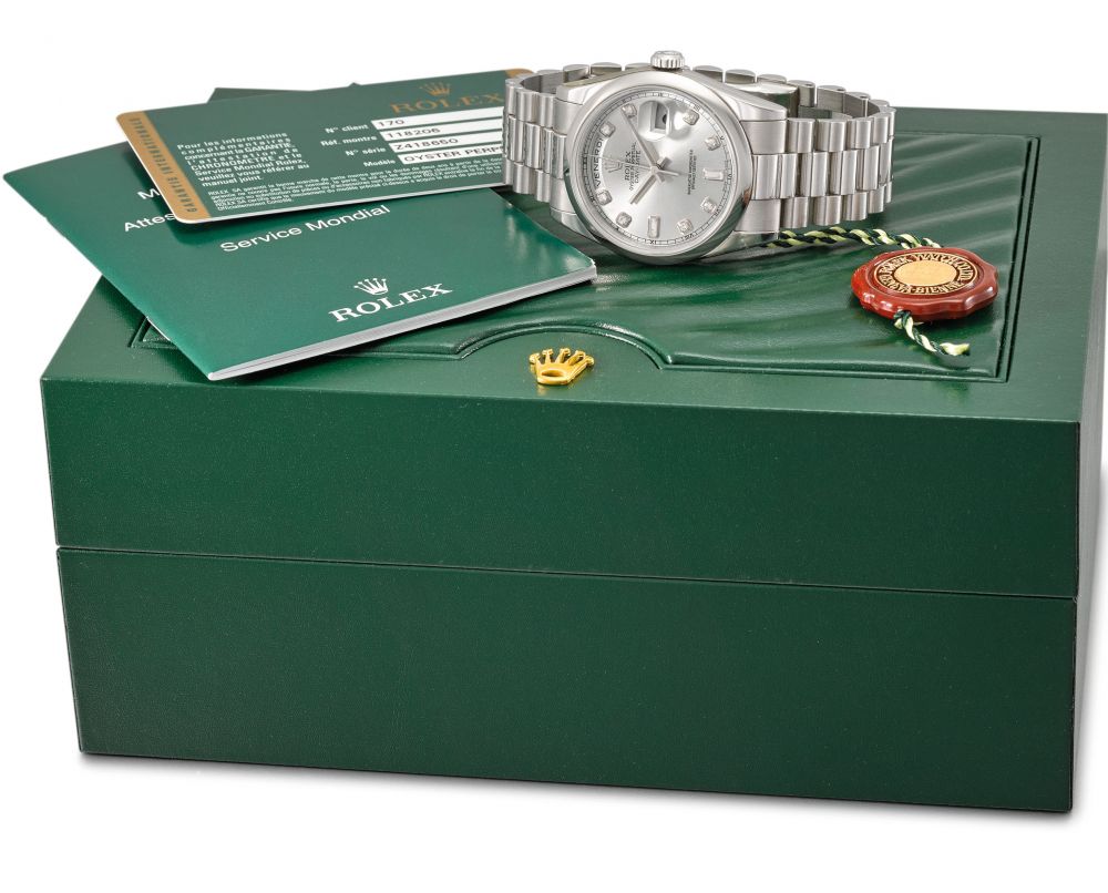 ROLEX. A VERY FINE AND RARE PLATINUM AUTOMATIC WRISTWATCH WITH SWEEP CENTRE SECONDS, DAY, DATE, DIAMOND-SET DIAL, BRACELET, INTERNATIONAL GUARANTEE AND BOX