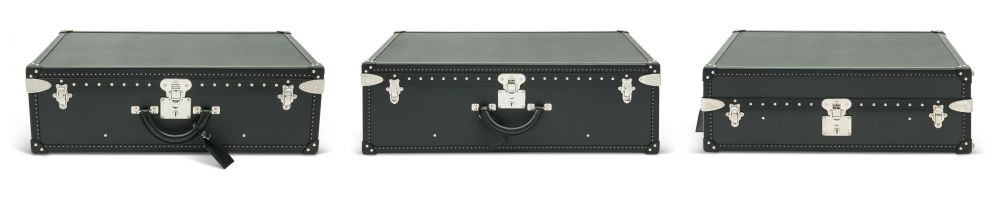 A SET OF THREE: A BLACK TAÏGA LEATHER ALZER 70, ALZER 80 SHOE TRUNK WITH SILVER HARDWARE
