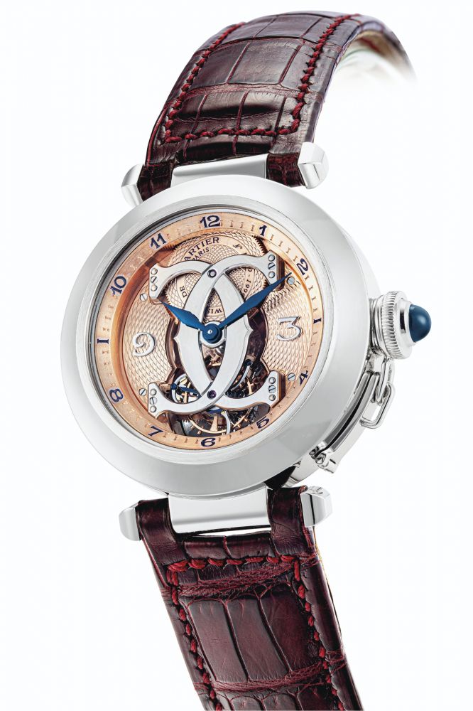CARTIER. AN EXTREMELY RARE 18K WHITE GOLD LIMITED EDITION SEMI-SKELETONISED TOURBILLON WRISTWATCH