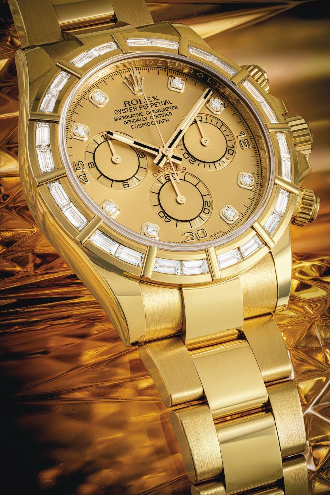 ROLEX. AN 18K GOLD AND DIAMOND-SET AUTOMATIC CHRONOGRAPH WRISTWATCH WITH BRACELET