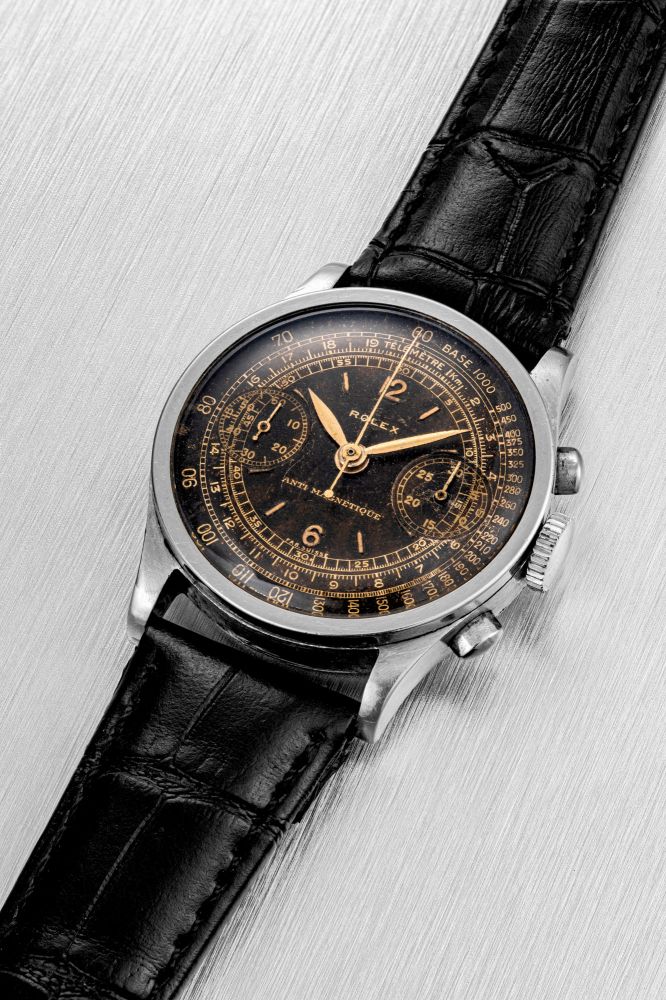 ROLEX. A RARE STAINLESS STEEL CHRONOGRAPH WRISTWATCH WITH BLACK DIAL