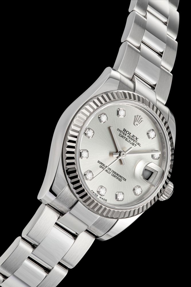 ROLEX. A STAINLESS STEEL AND DIAMOND-SET AUTOMATIC WRISTWATCH WITH SWEEP CENTRE SECONDS, DATE AND BRACELET