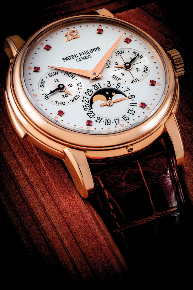 PATEK PHILIPPE. AN IMPORTANT AND POSSIBLY UNIQUE 18K PINK GOLD AUTOMATIC MINUTE REPEATING PERPETUAL CALENDAR WRISTWATCH WITH MOON PHASES, 24 HOUR AND LEAP YEAR INDICATION AND RUBY-SET DIAL