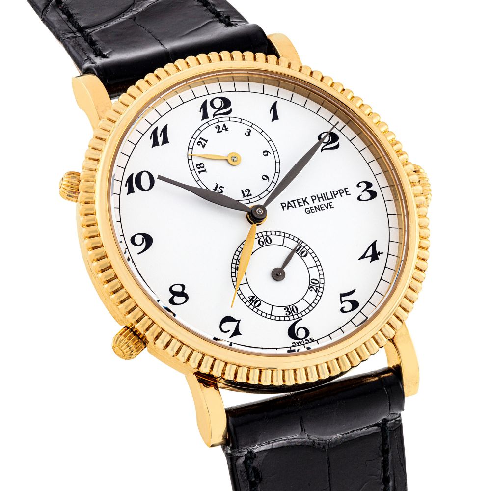 PATEK PHILIPPE, GOLD TRAVEL TIME, REF. 5034J -