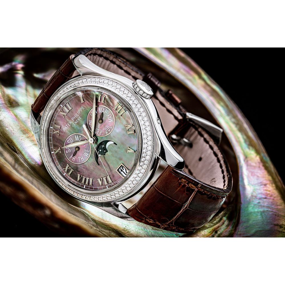 PATEK PHILIPPE, WHITE GOLD AND DIAMOND-SET ANNUAL CALENDAR, REF. 4936G -