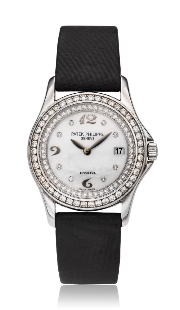 PATEK PHILIPPE, TIFFANY CO. MOTHER OF PEARL DIAL, CALATRAVA, 18K WHITE GOLD DIAMONDS, REF. 4906 -
