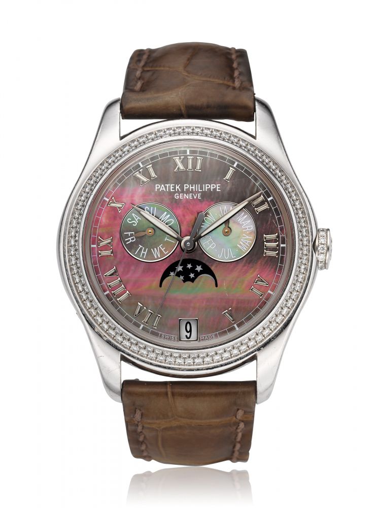 PATEK PHILIPPE, LADIES ANNUAL CALENDAR WITH MOON PHASES, REF. 4936G -