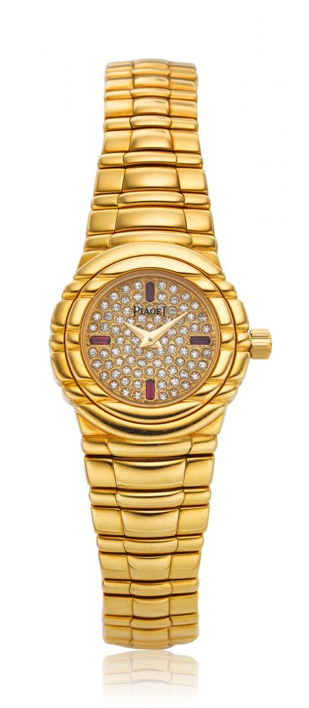 PIAGET, A 18K YELLOW GOLD, DIAMOND AND RUBY-SET LADY’S WRISTWATCH, REF. GOA 15264 -