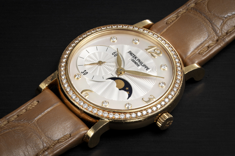 PATEK PHILIPPE, CALATRAVA REF. 4958J, A LADIES MANUAL-WINDING GOLD AND DIAMOND-SET WRISTWATCH WITH MOON-PHASE - CASE