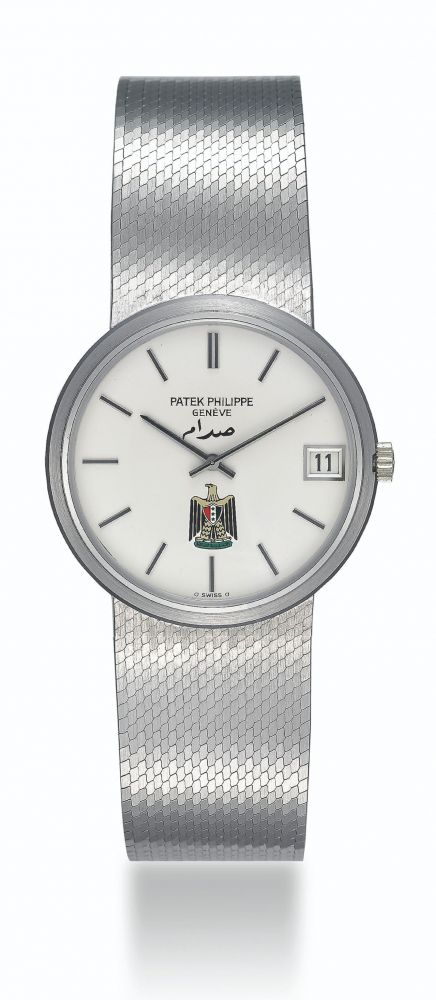 PATEK PHILIPPE, WHITE GOLD CALATRAVA WITH IRAQI COAT OF ARMS, REF. 3601/1 - MOVEMENT NO. 1’300’743, CASE NO. 526’771