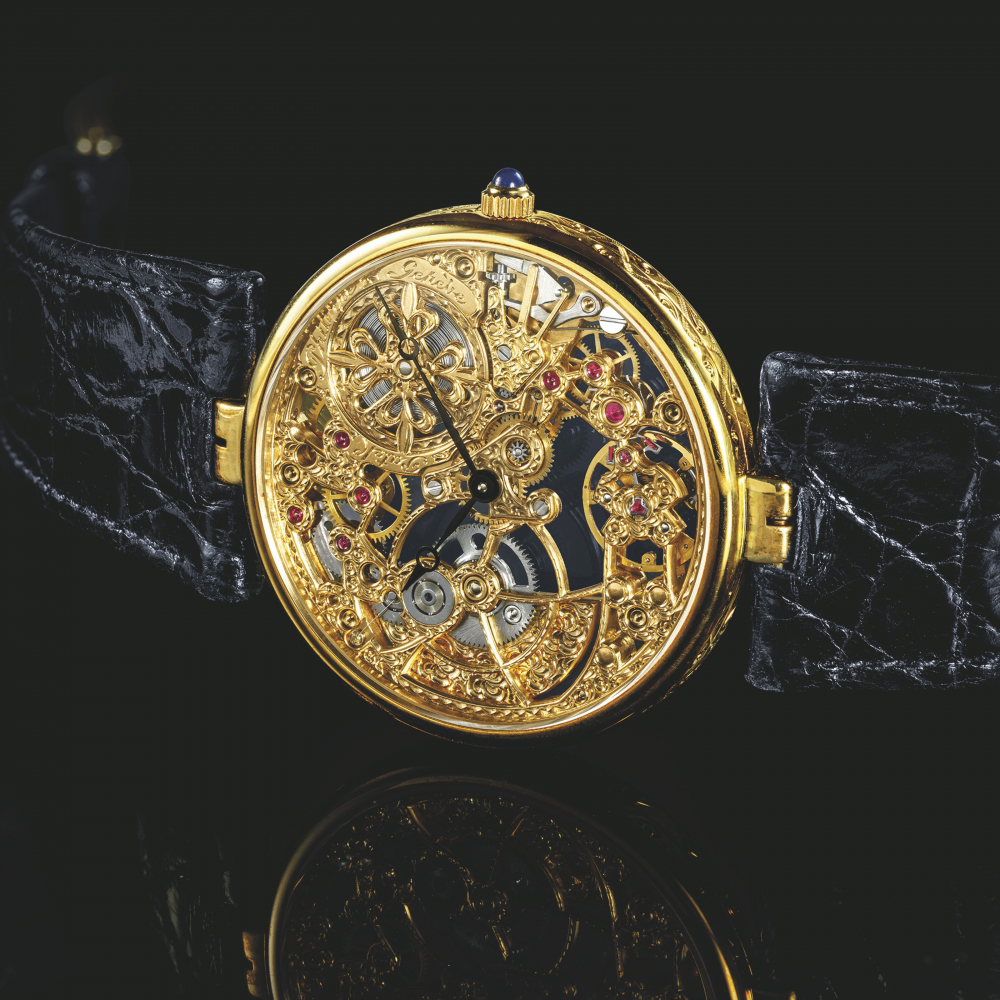 PATEK PHILIPPE. AN 18K GOLD SKELETONISED AUTOMATIC WRISTWATCH