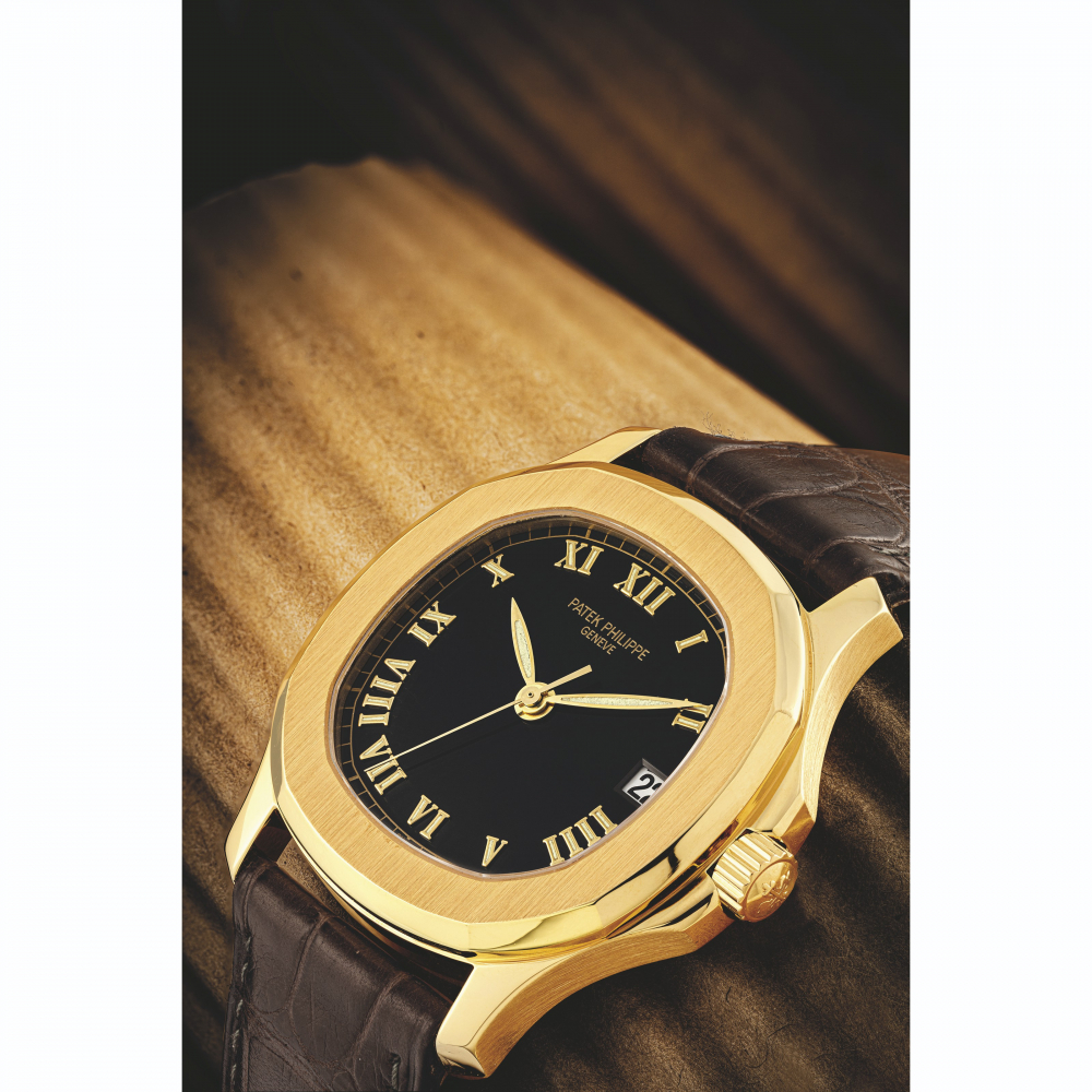 PATEK PHILIPPE. AN 18K GOLD AUTOMATIC WRISTWATCH WITH SWEEP CENTRE SECONDS AND DATE