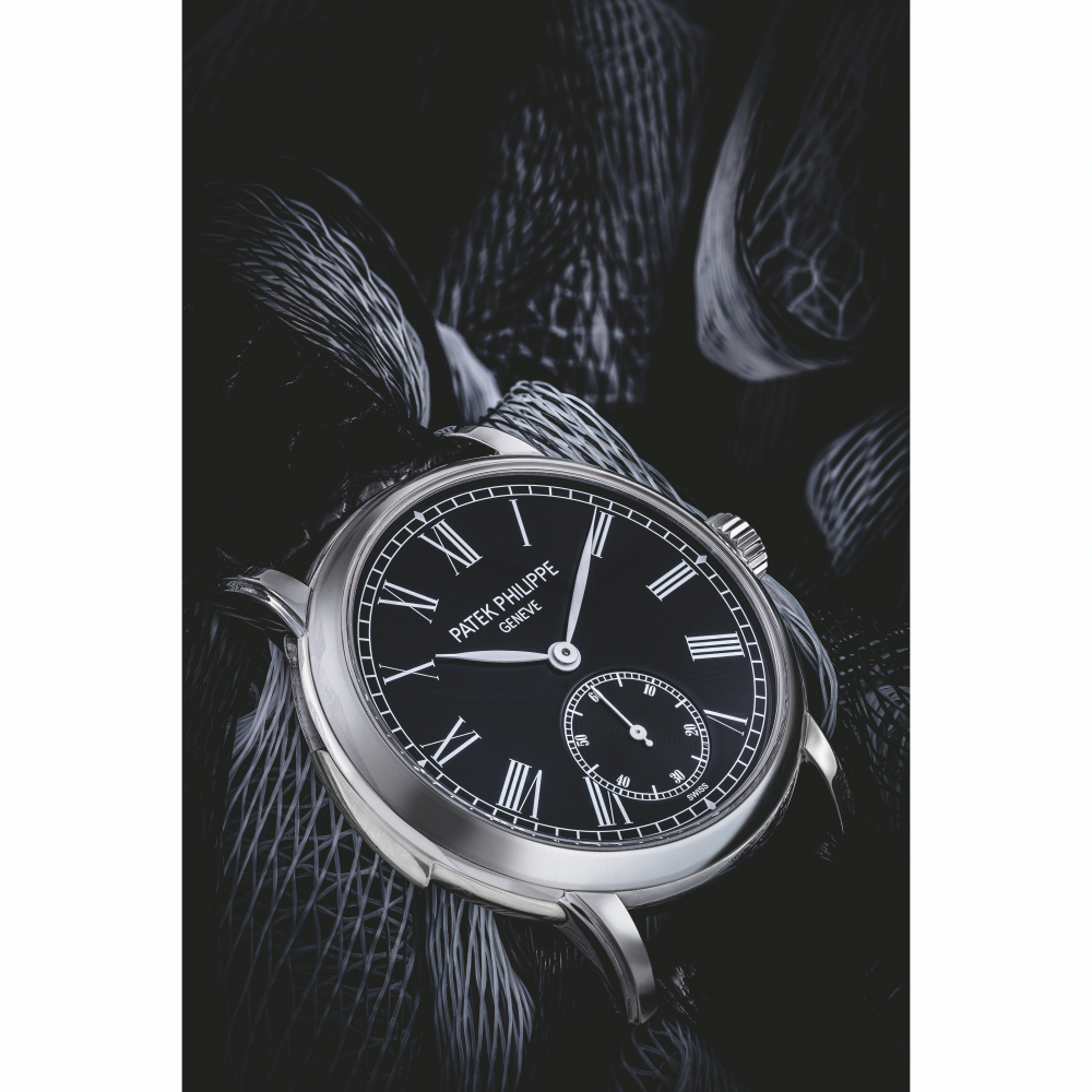 PATEK PHILIPPE. A VERY RARE PLATINUM AUTOMATIC MINUTE REPEATING WRISTWATCH