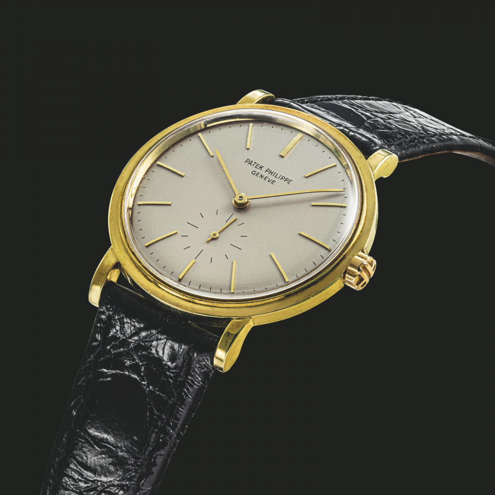 PATEK PHILIPPE. AN 18K GOLD AUTOMATIC WRISTWATCH
