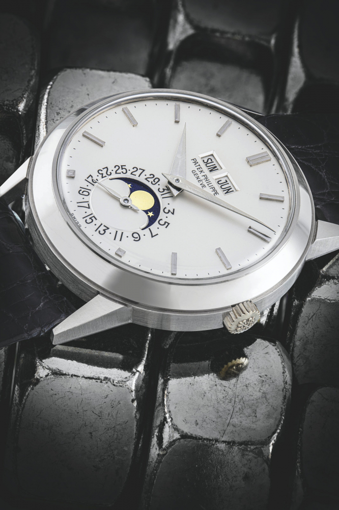PATEK PHILIPPE. A VERY RARE AND HIGHLY ATTRACTIVE 18K WHITE GOLD AUTOMATIC PERPETUAL CALENDAR WRISTWATCH WITH MOON PHASES