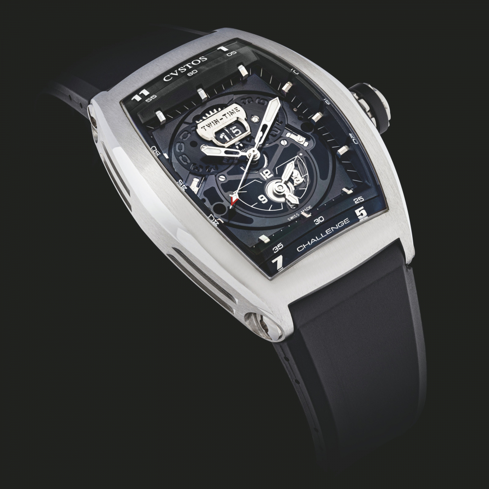 CVSTOS. A STAINLESS STEEL TONNEAU-SHAPED DUAL-TIME SEMI-SKELETONISED AUTOMATIC WRISTWATCH WITH SWEEP CENTRE SECONDS AND DATE