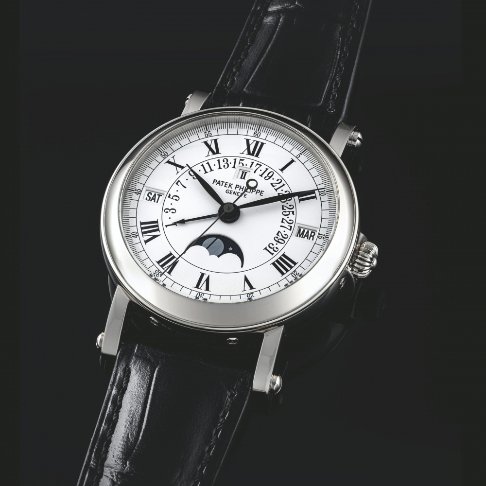 PATEK PHILIPPE. AN 18K WHITE GOLD AUTOMATIC PERPETUAL CALENDAR WRISTWATCH WITH SWEEP CENTRE SECONDS, RETROGRADE DATE, MOON PHASES AND LEAP YEAR INDICATION