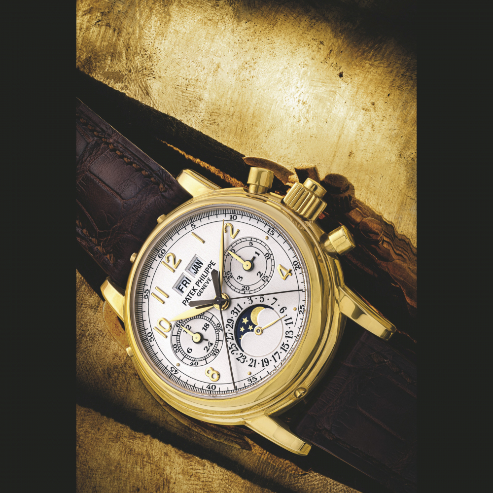 PATEK PHILIPPE. AN 18K GOLD PERPETUAL CALENDAR SPLIT SECONDS CHRONOGRAPH WRISTWATCH WITH MOON PHASES, 24 HOUR AND LEAP YEAR INDICATION