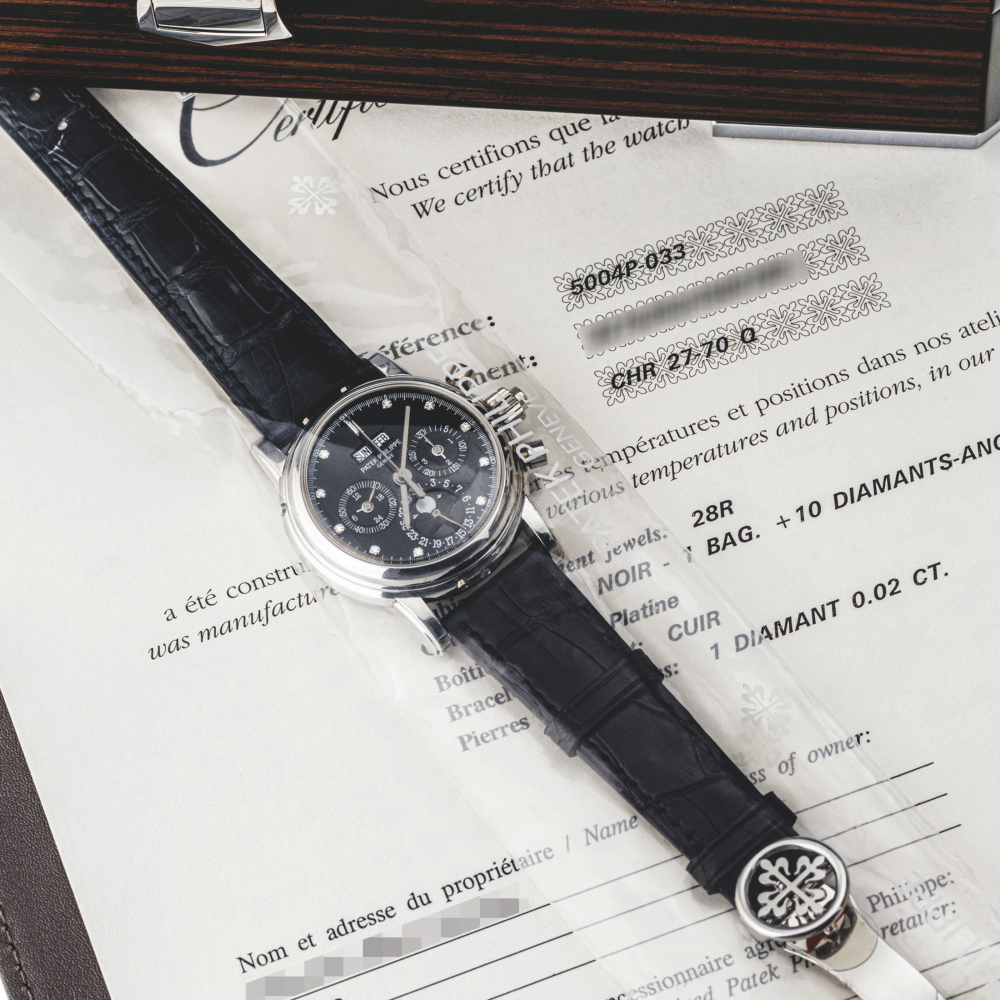 PATEK PHILIPPE. A PLATINUM AND DIAMOND-SET PERPETUAL CALENDAR SPLIT SECONDS CHRONOGRAPH WRISTWATCH WITH MOON PHASES, 24 HOUR, LEAP YEAR INDICATION AND BLACK DIAL, SINGLE-SEALED