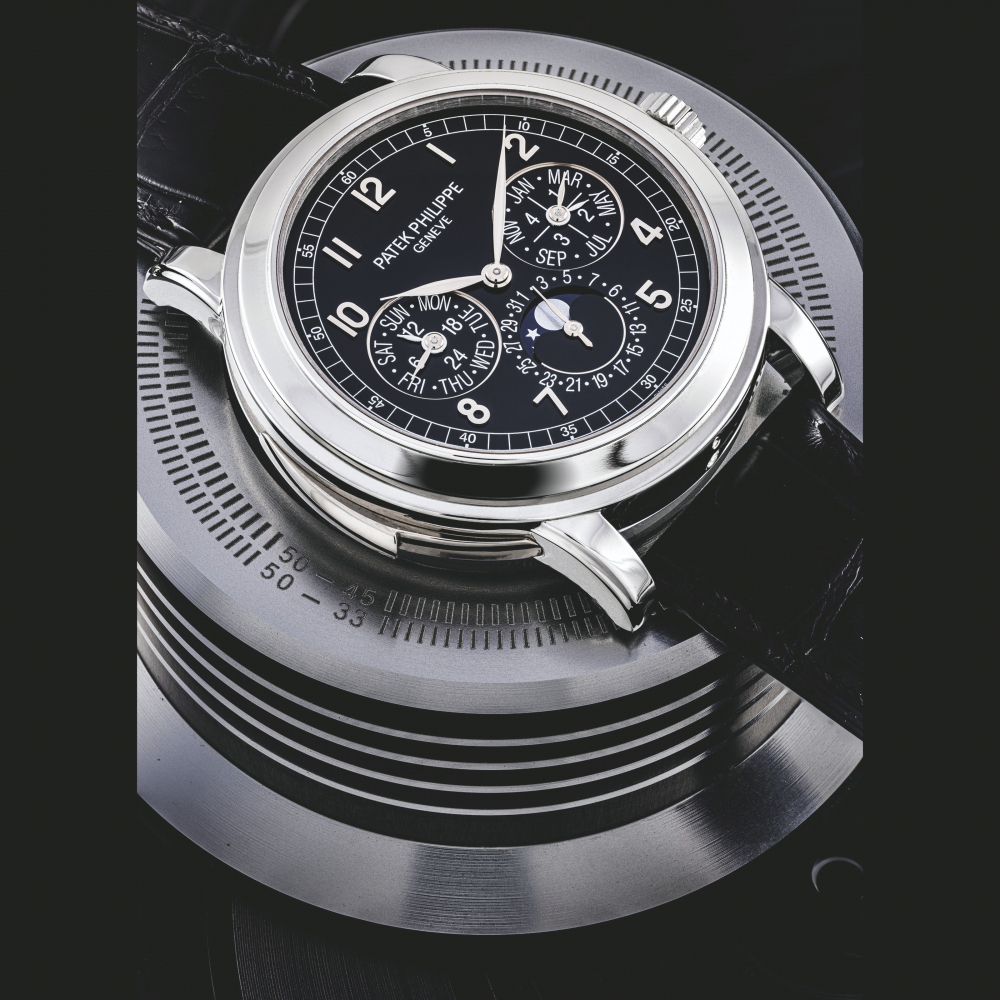 PATEK PHILIPPE. A RARE PLATINUM AUTOMATIC “CATHEDRAL” MINUTE REPEATING PERPETUAL CALENDAR WRISTWATCH WITH MOON PHASES, 24 HOUR AND LEAP YEAR INDICATION
