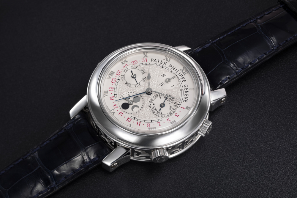 PATEK PHILIPPE, REF. 5002P-001 SKY MOON TOURBILLON, AN EXTREMELY RARE PLATINUM DOUBLE DIALED WRISTWATCH WITH 12 COMPLICATIONS - CASE