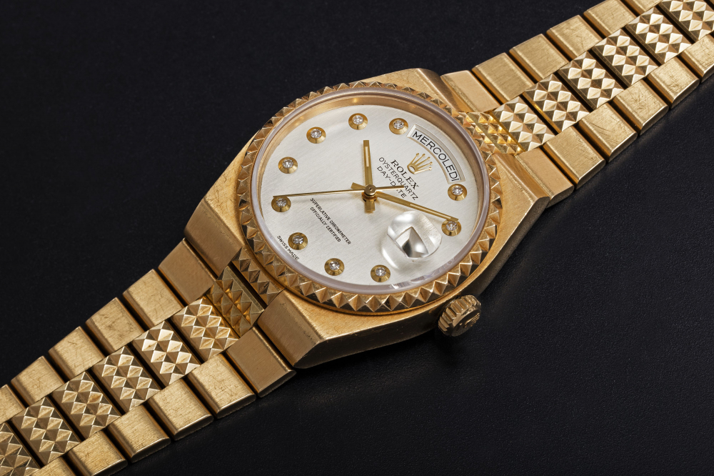 ROLEX, A GOLD OYSTERQUARTZ DAY-DATE “PYRAMID”, REF. 19028 - CASE