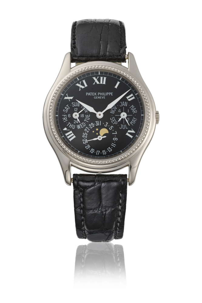 PATEK PHILIPPE. A VERY RARE 18K WHITE GOLD LIMITED SERIES AUTOMATIC PERPETUAL CALENDAR WRISTWATCH WITH MOON PHASES