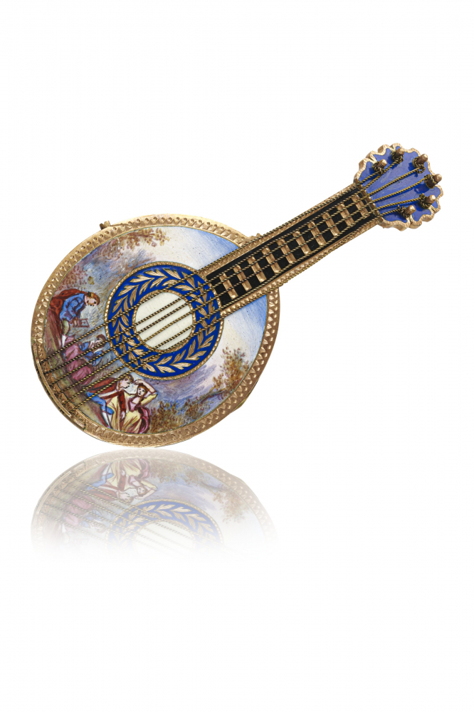 LENOIR À PARIS. A SMALL AND ATTRACTIVE 18K GOLD AND ENAMEL MANDOLIN FORM WATCH WITH CONCEALED DIAL