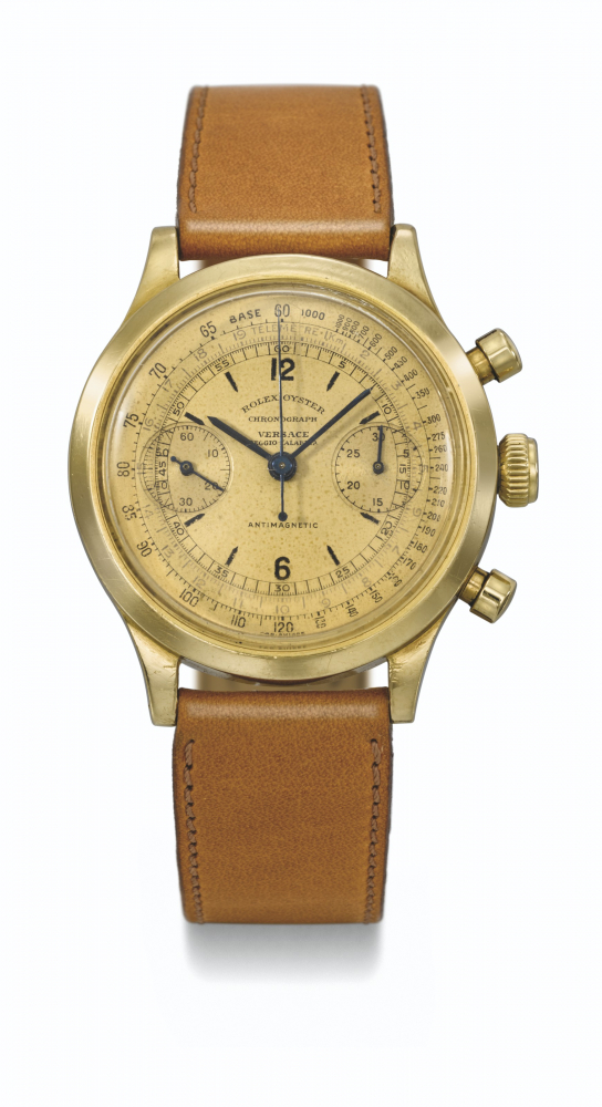 ROLEX. A VERY RARE AND EARLY 18K GOLD CHRONOGRAPH WRISTWATCH WITH MULTISCALE DIAL RETAILED BY VERSACE