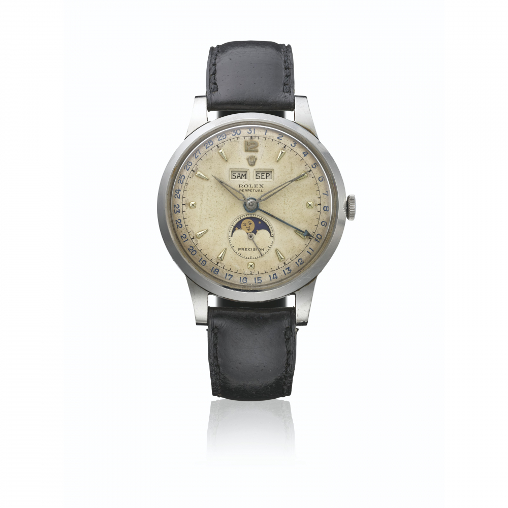 ROLEX. A VERY RARE STAINLESS STEEL AUTOMATIC TRIPLE CALENDAR WRISTWATCH WITH MOON PHASES