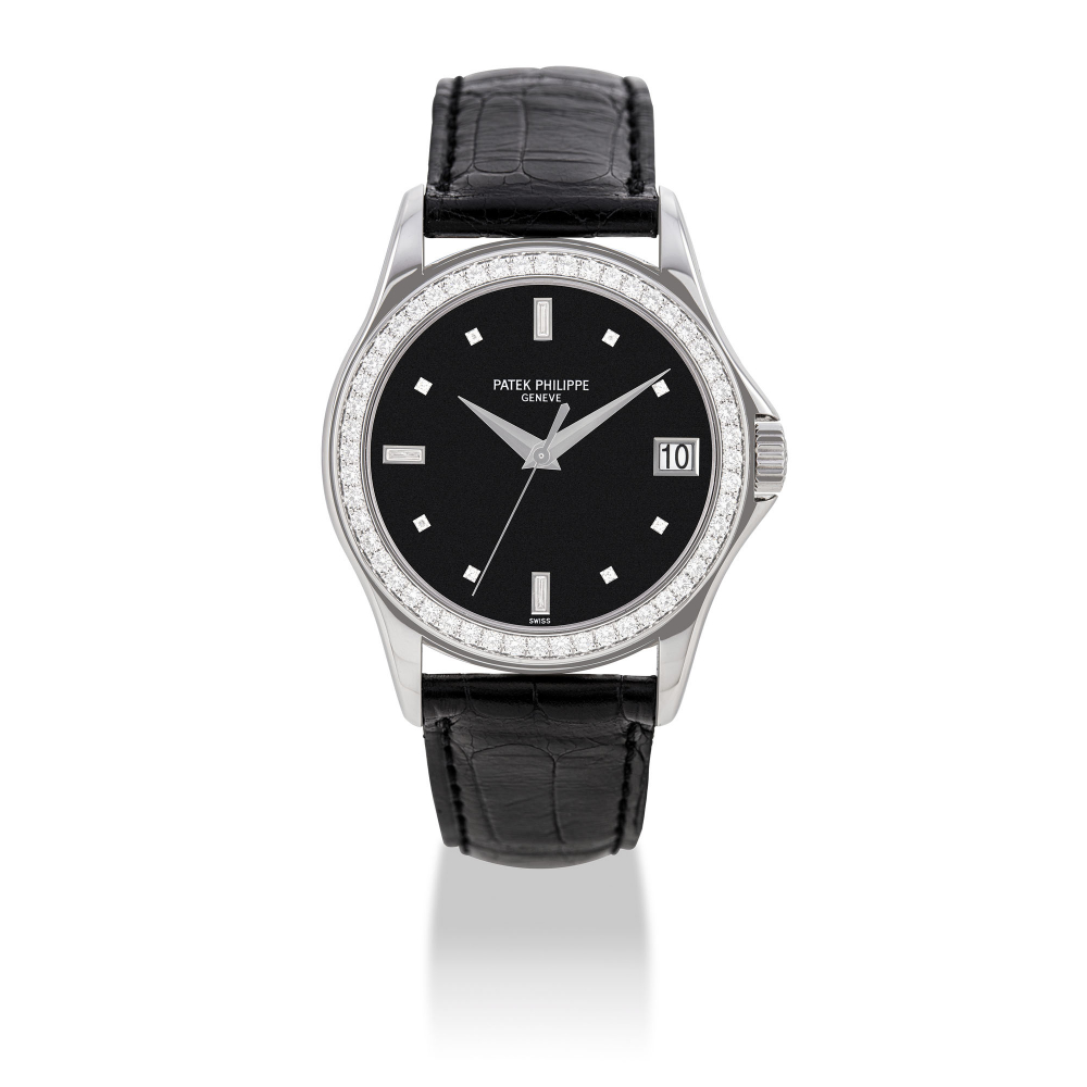 PATEK PHILIPPE, WHITE GOLD AND DIAMOND-SET WITH DATE, REF.5108 -