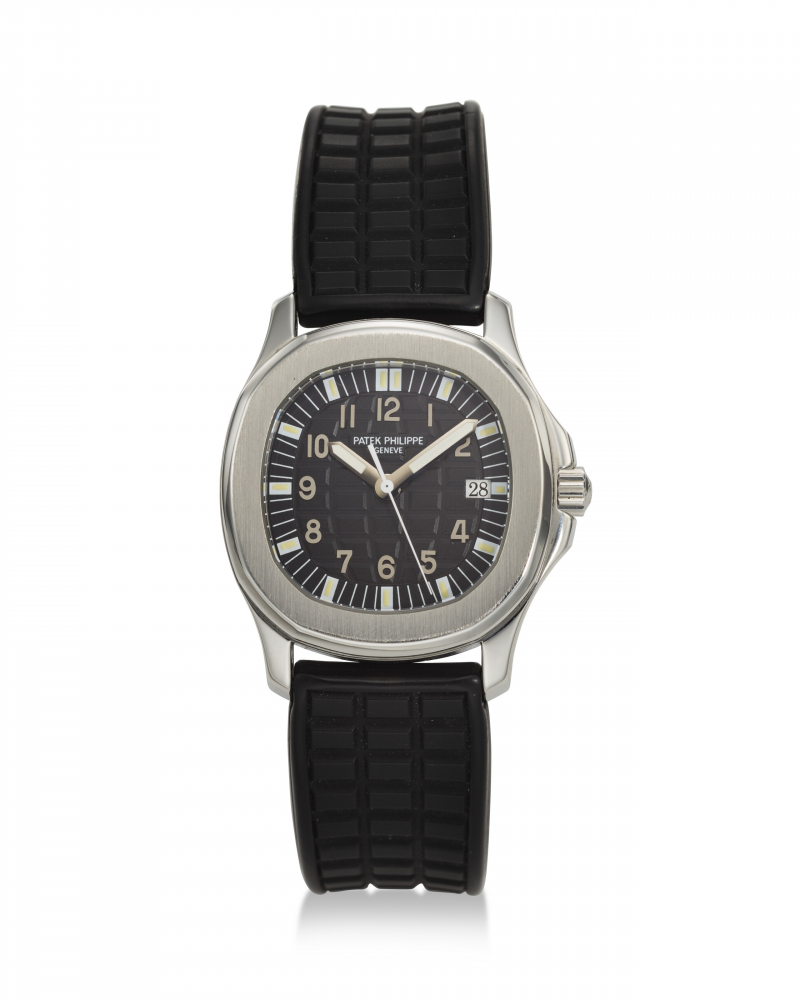 PATEK PHILIPPE, REF. 5064A-001, AQUANAUT, A FINE STEEL CUSHION-SHAPED QUARTZ WRISTWATCH WITH DATE -