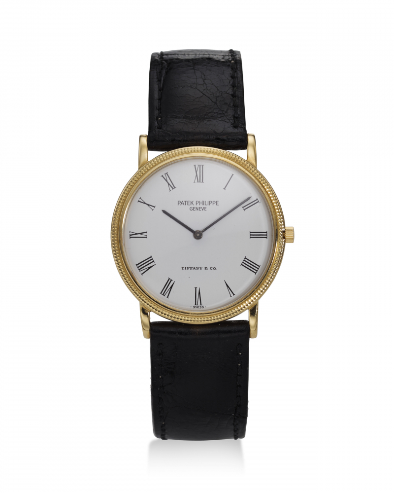 PATEK PHILIPPE, RETAILED BY TIFFANY CO., REF. 3520/D, CALATRAVA, A FINE 18K YELLOW GOLD WRISTWATCH -