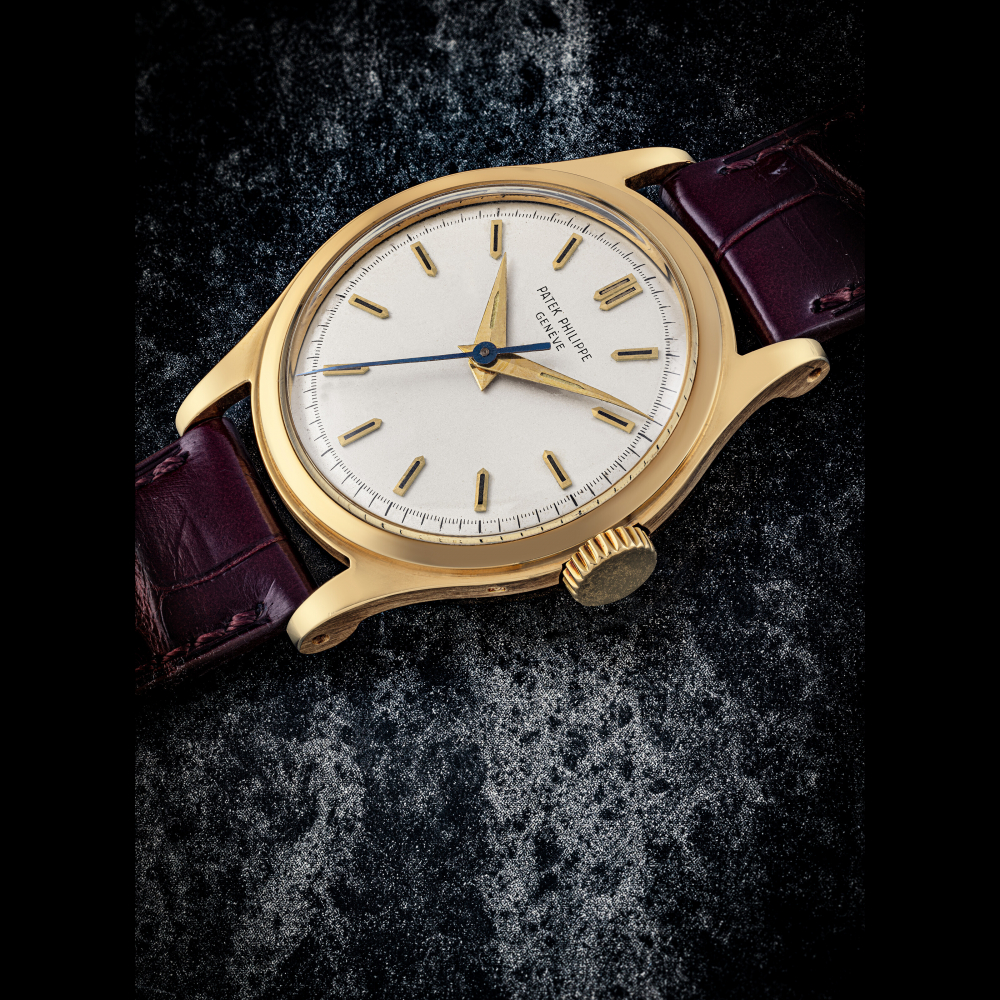 PATEK PHILIPPE. A RARE 18K GOLD WRISTWATCH WITH SWEEP CENTRE SECONDS AND RADIUM INDEXES