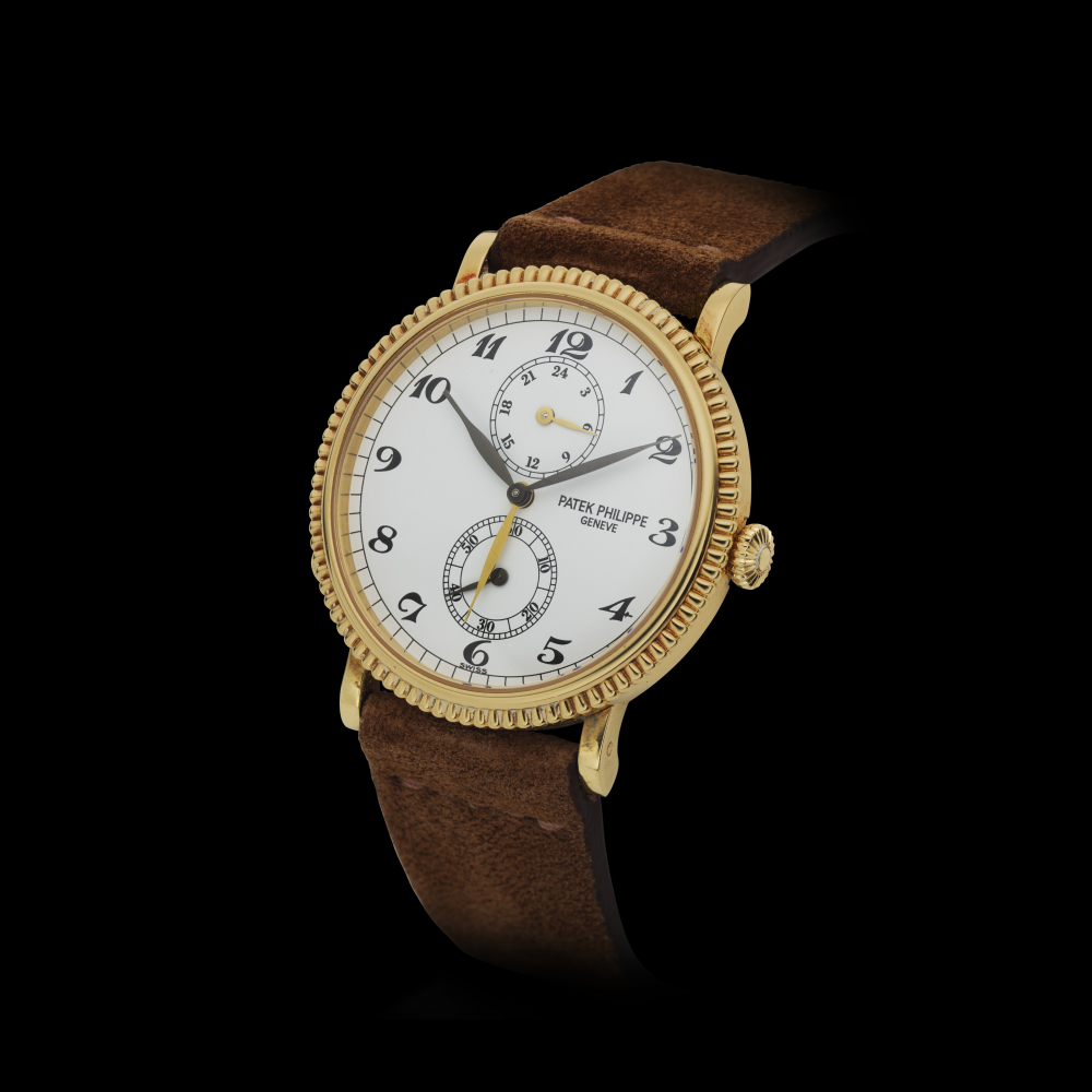 PATEK PHILIPPE, 18K YELLOW GOLD TRAVEL TIME, DUAL TIME WRISTWATCH, REF. 5034 -