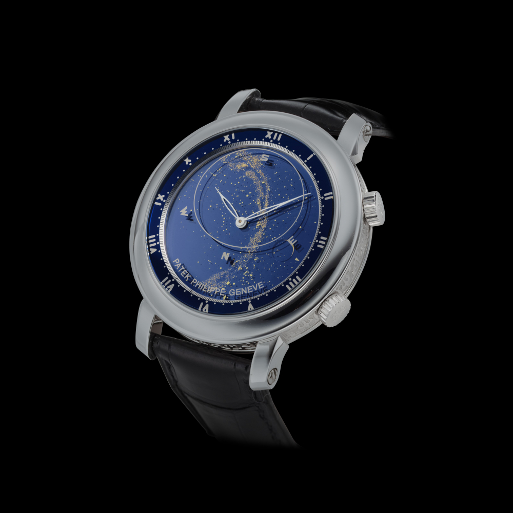 PATEK PHILIPPE. A VERY FINE AND RARE REF 5102G, 18K WHITE GOLD AUTOMATIC ASTRONOMICAL WRISTWATCH WITH SKY CHART, PHASES AND ORBIT OF THE MOON -