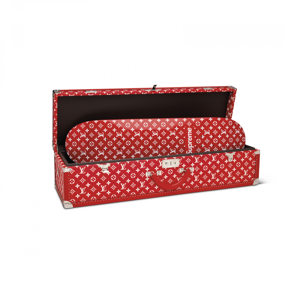 A LIMITED EDITION RED WHITE MONOGRAM BOÎTE SKATEBOARD TRUNK WITH SILVER HARDWARE BY SUPREME