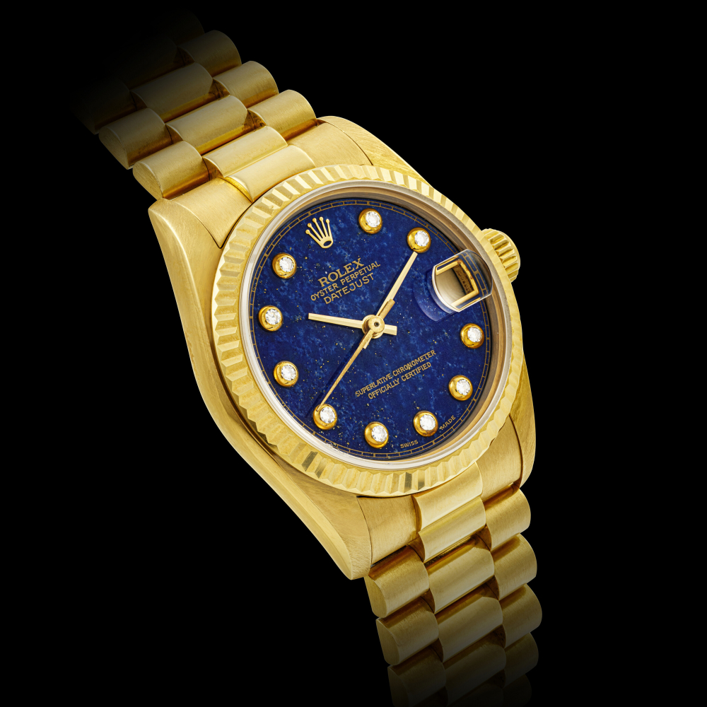 ROLEX. AN 18K GOLD AND DIAMOND-SET AUTOMATIC WRISTWATCH WITH SWEEP CENTRE SECONDS, DATE, BRACELET AND LAPIS LAZULI DIAL