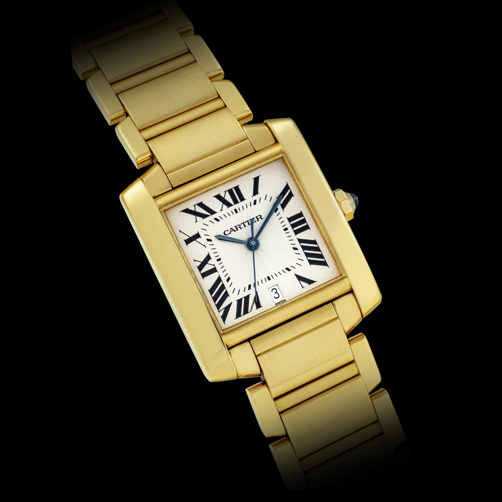 CARTIER. AN 18K GOLD AUTOMATIC WRISTWATCH WITH SWEEP CENTRE SECONDS, DATE AND BRACELET