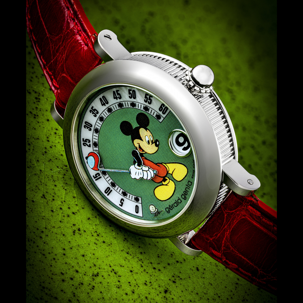 GERALD GENTA. A STAINLESS STEEL AUTOMATIC WRISTWATCH WITH JUMP HOUR, RETROGRADE MINUTE AND MOTHER-OR-PEARL DIAL