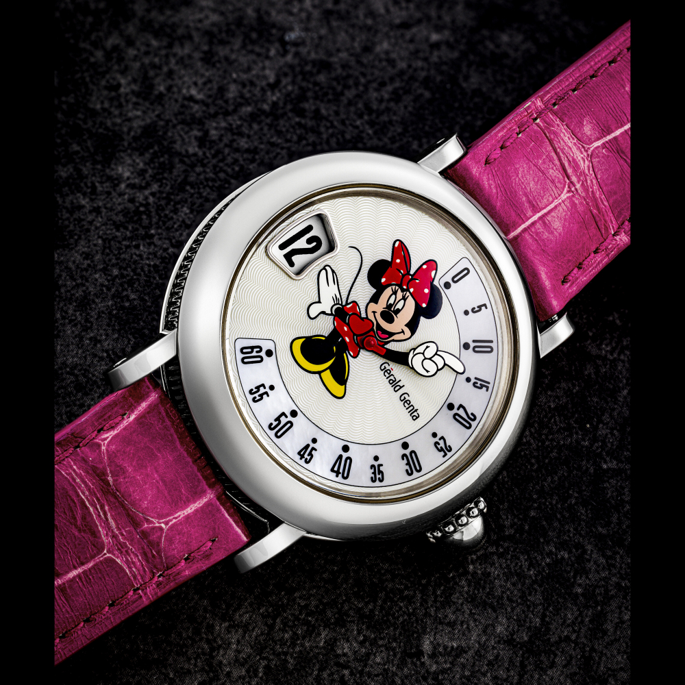 GERALD GENTA. A STAINLESS STEEL AUTOMATIC JUMP HOUR WRISTWATCH WITH RETROGRADE MINUTES AND MOTHER-OF-PEARL DIAL