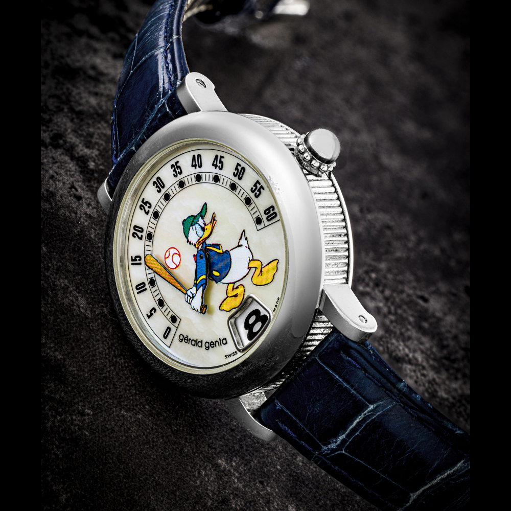GERALD GENTA. A STAINLESS STEEL AUTOMATIC JUMP HOUR WRISTWATCH WITH RETROGRADE MINUTES AND MOTHER-OF-PEARL DIAL