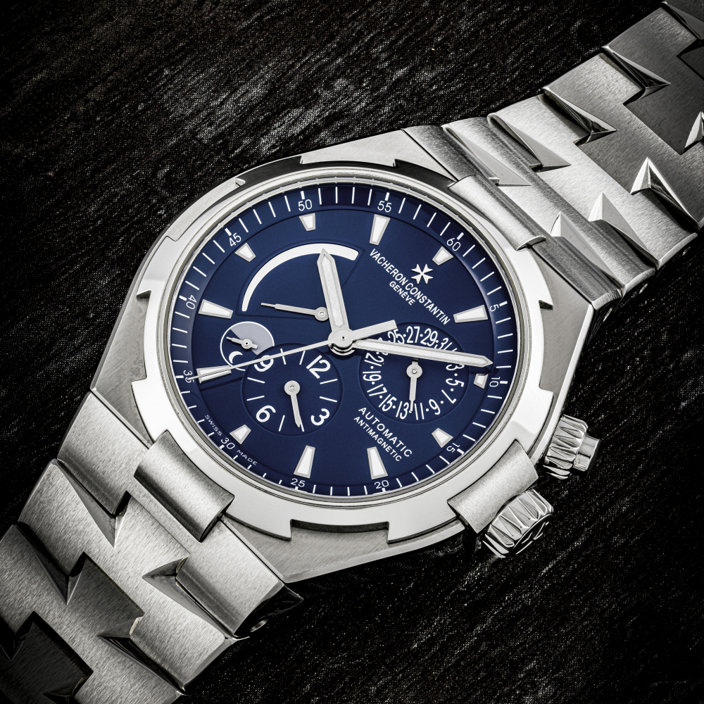 VACHERON CONSTANTIN. A RARE STAINLESS STEEL LIMITED EDITION AUTOMATIC DUAL TIME WRISTWATCH WITH SWEEP CENTRE SECONDS, DATE, POWER RESERVE, DAY/NIGHT INDICATION AND BRACELET