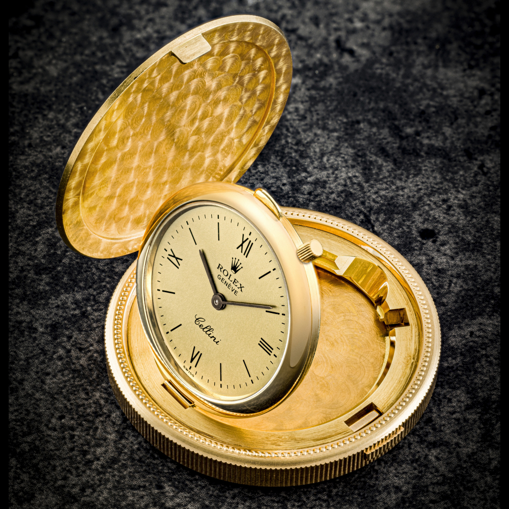 ROLEX. AN 18K GOLD TWENTY DOLLAR COIN WATCH