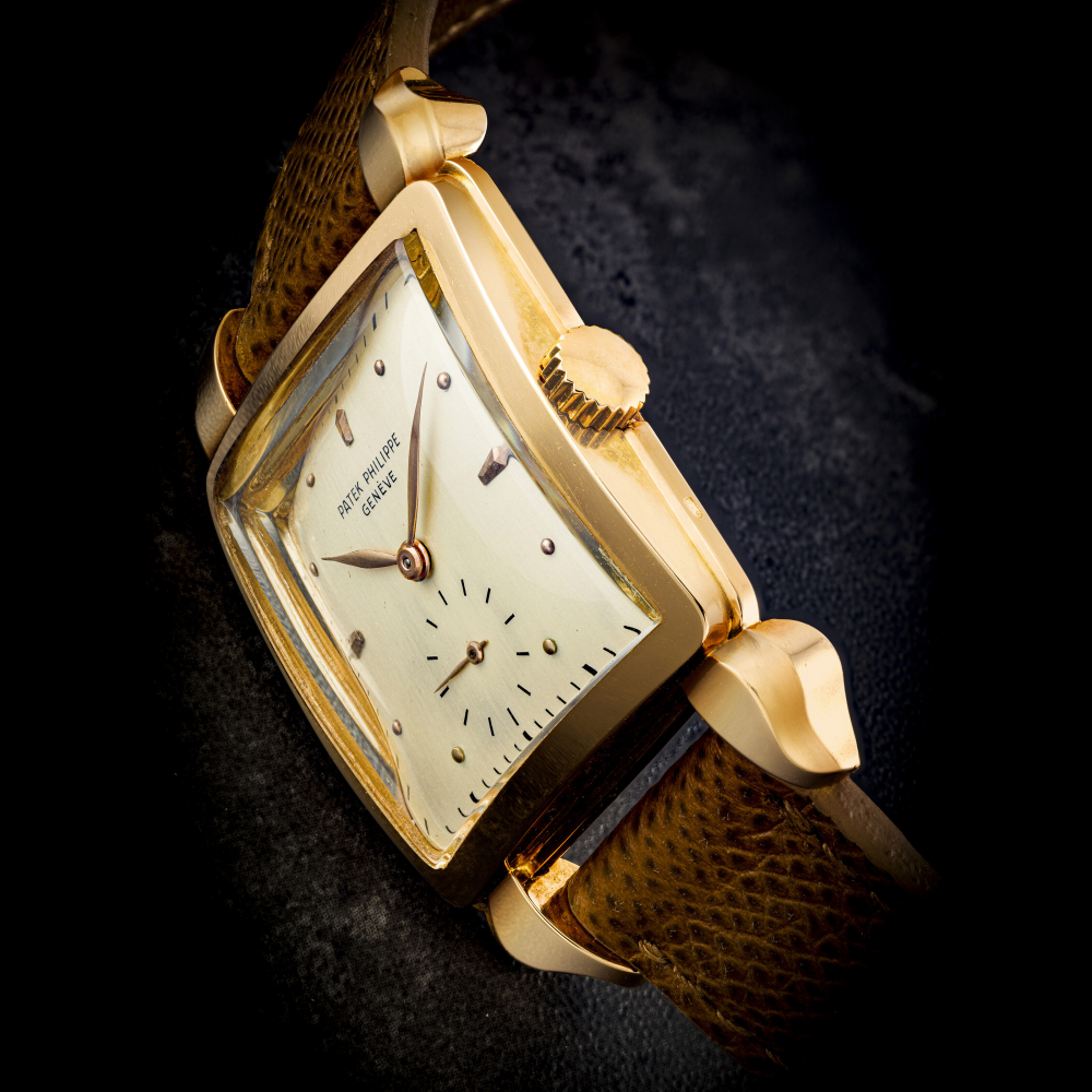 PATEK PHILIPPE. AN IMPRESSIVE 18K PINK GOLD WRISTWATCH WITH OVERSIZED LUGS