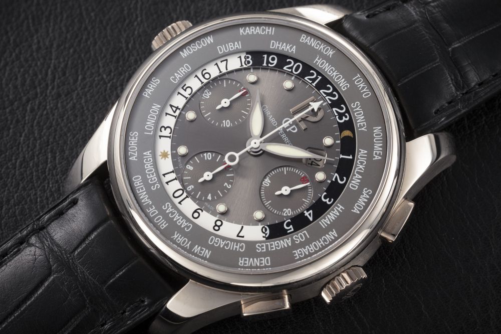 GIRARD-PERREGAUX, WW.TC REF. 49805, A GOLD AUTOMATIC WORLD TIME CHRONOGRAPH - CASE