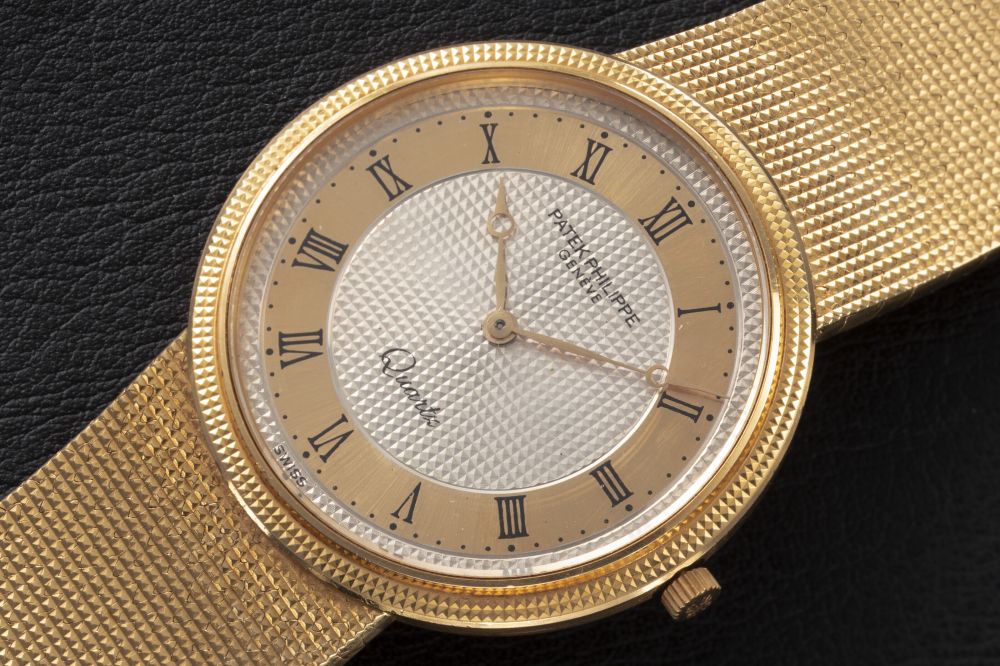 PATEK PHILIPPE, REF. 3744/1, A GOLD QUARTZ WRISWATCH - CASE