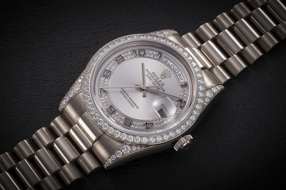 ROLEX, DAY-DATE REF. 118389, A GOLD AND DIAMOND-SET WRISTWATCH WITH DIAMOND-SET DIAL - CASE