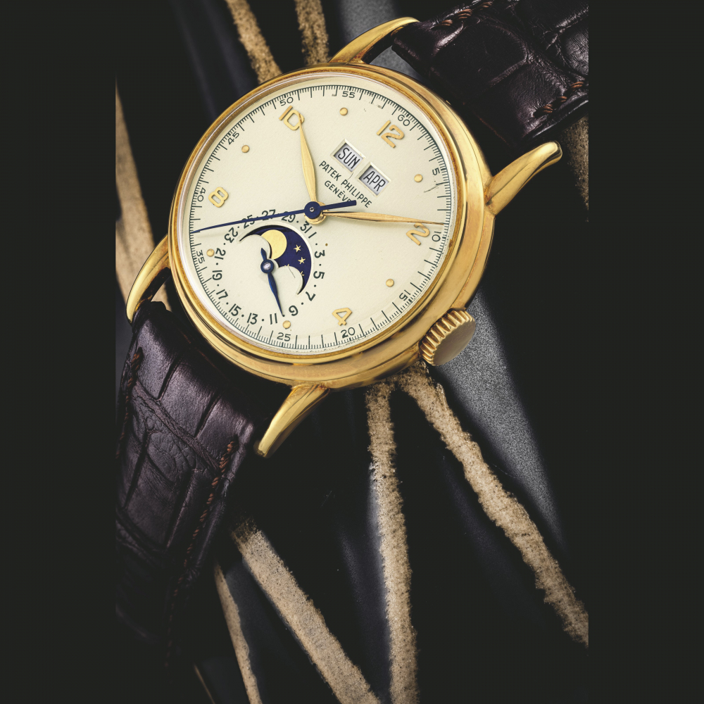 PATEK PHILIPPE. AN EXTREMELY FINE, HIGHLY IMPORTANT AND HISTORIC 18K GOLD PERPETUAL CALENDAR WRISTWATCH WITH SWEEP CENTRE SECONDS, MOON PHASES, CERTIFICATE OF ORIGIN, PATEK PHILIPPE SALES RECEIPT, SOLD TO REGINALD ‘PETE’ H. FULLERTON JR., GRANDSON OF HENR