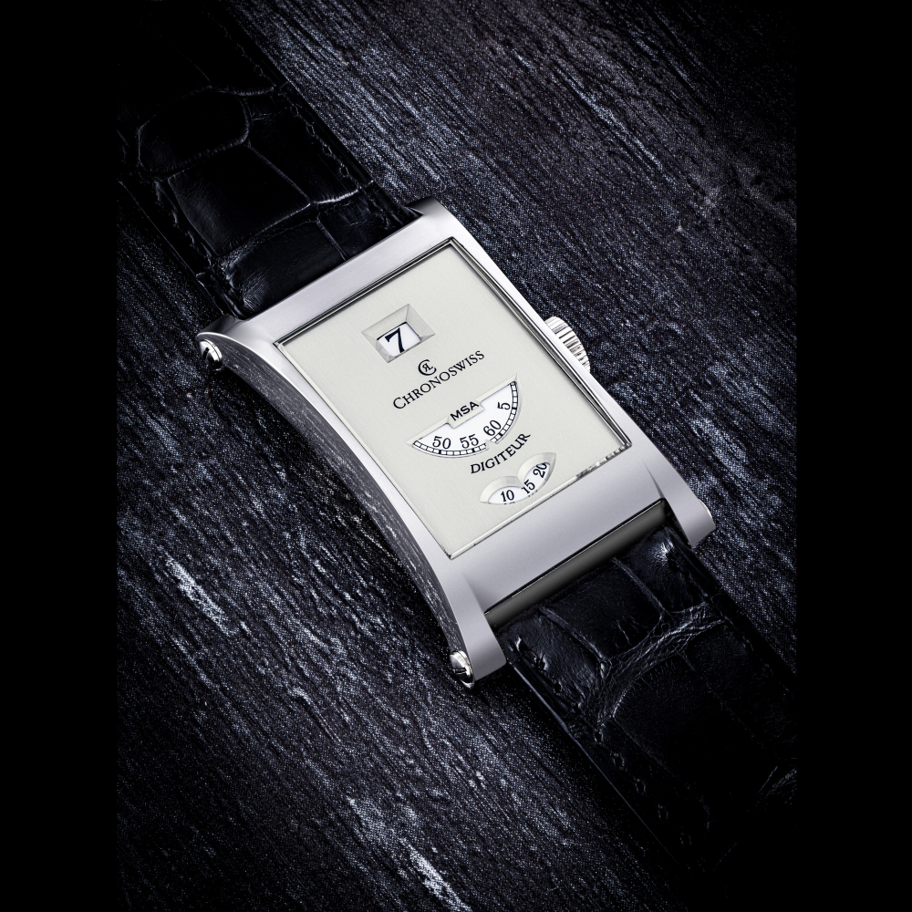CHRONOSWISS. AN 18K WHITE GOLD LIMITED EDTION WRISTWATCH WITH JUMP HOUR, WANDERING SECONDS AND MINUTES